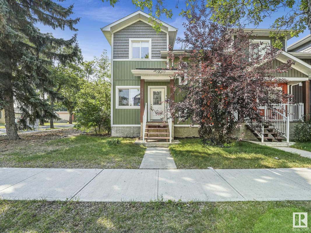 12205/07/09 121 Avenue NW, Edmonton, AB T5M 2A3 House For Sale RE/MAX