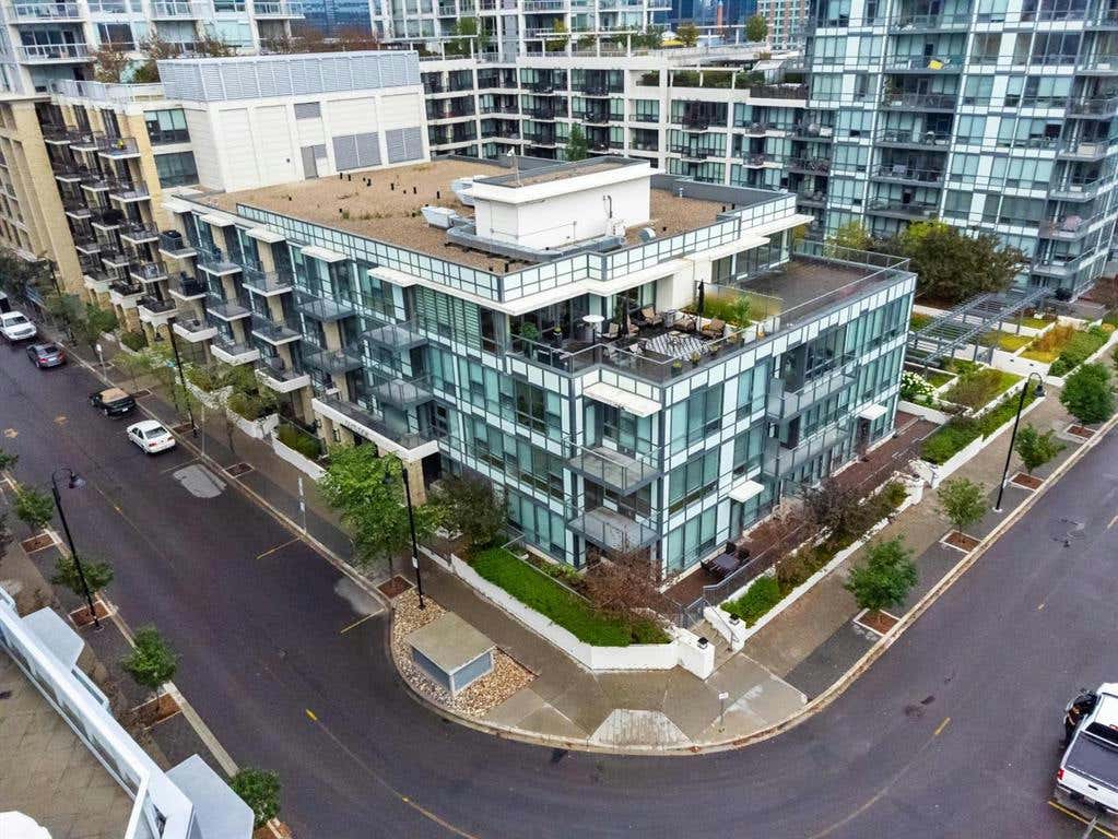 409, 51 Waterfront Mews SW, Calgary, AB T2P 0X3 Condo For Sale RE/MAX