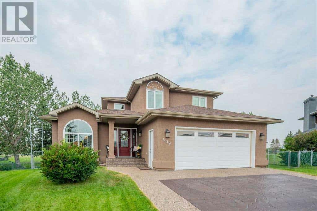 409 Lakeside Greens Place, Chestermere, AB T1X1C6 House For Sale RE