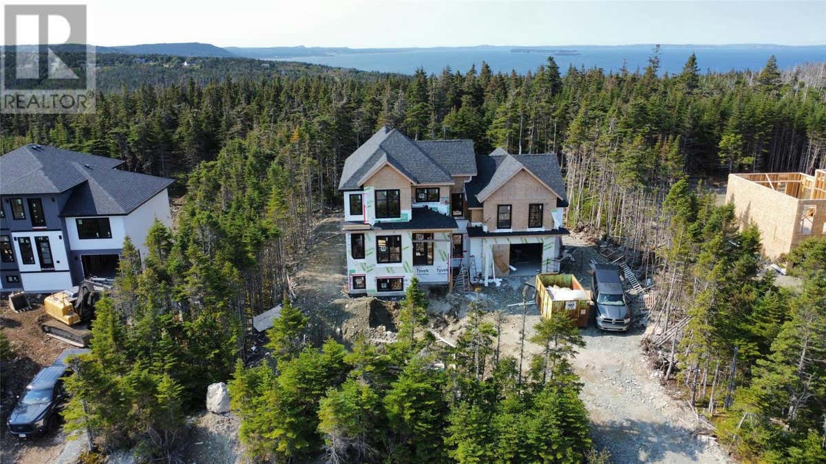 23 Patricia Drive, Portugal CoveSt. Philips, NL A1M0G7 À vendre RE