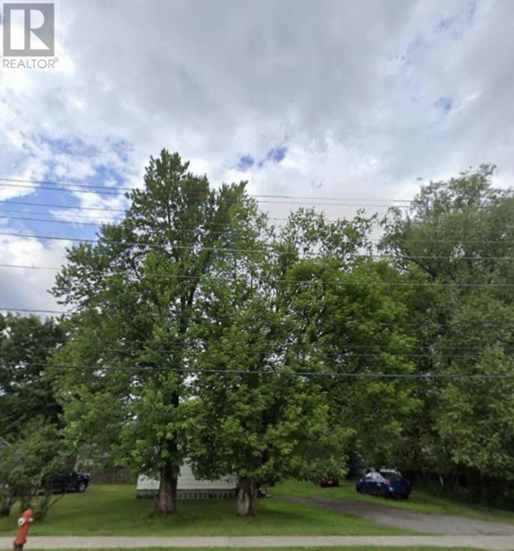 210 SIXTH ST E