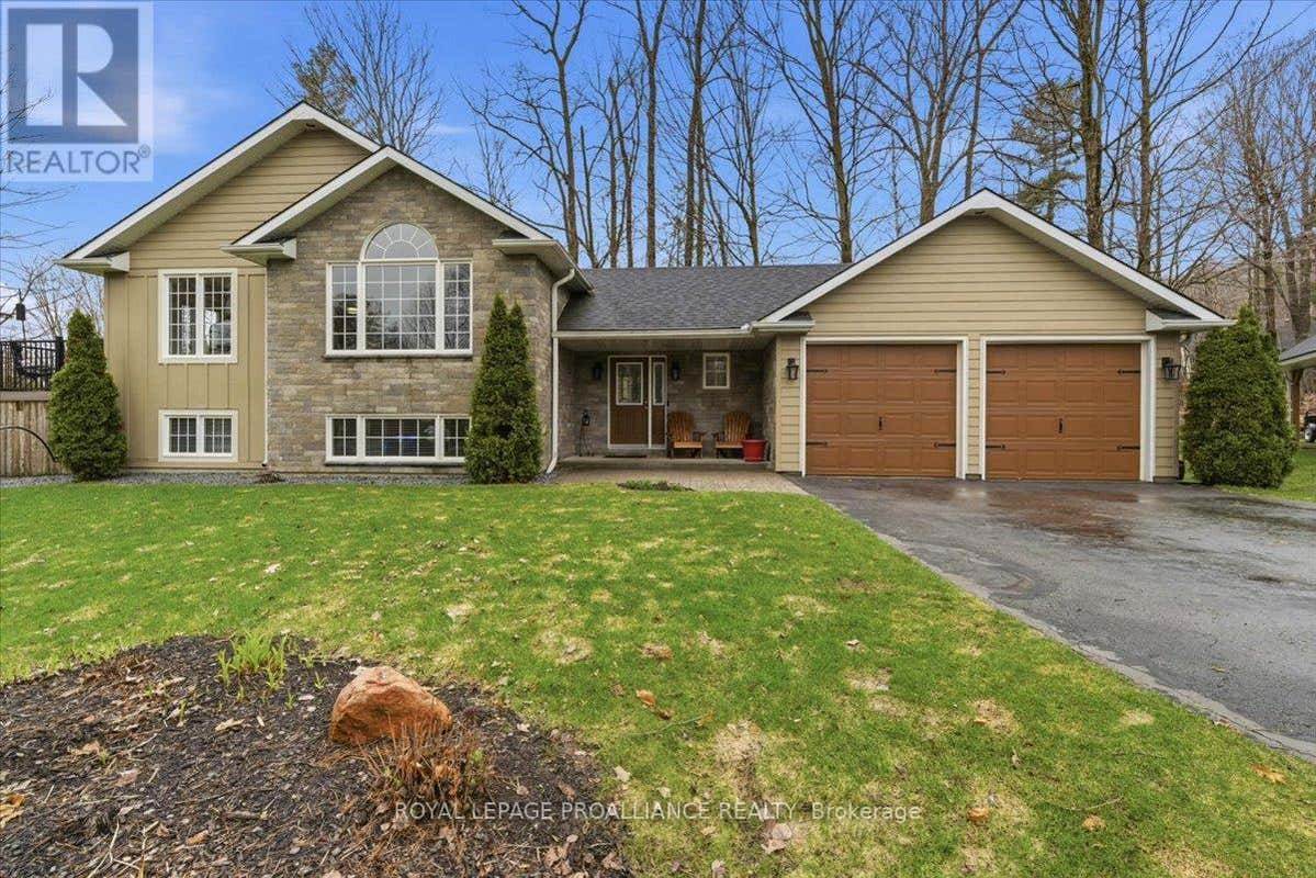 80 WHISPERING WOODS DRIVE