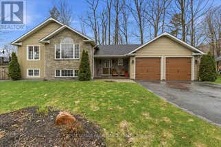 80 WHISPERING WOODS DRIVE