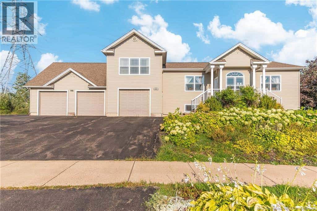 69 WHISPERWOOD DRIVE