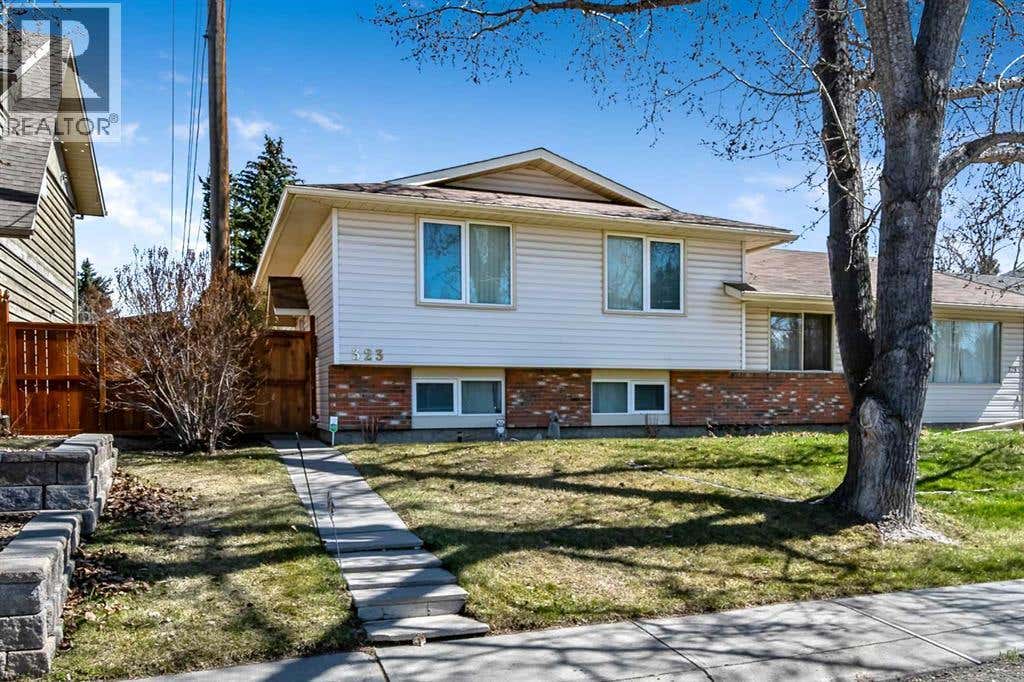 323 WOODVALE CRESCENT SW, CALGARY, AB T2W3L3 - Image 893f060dd53ff9dd0b57be66ffe38f41f30d75dd