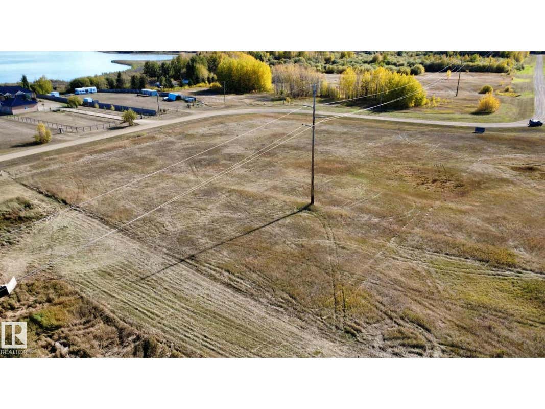 9 BECHTHOLD BAY 104, 191054 TWP 852