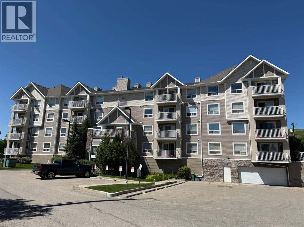 301, 128 CENTRE AVENUE, COCHRANE, AB T4C1Z4 - Image 941d2764f8dea6ec939f9d81e89b7846a68f45f3