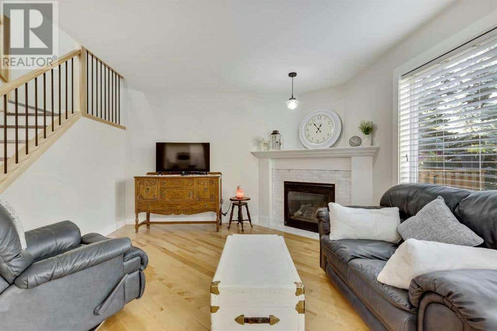 7, 117 Bow Ridge Drive, Cochrane, AB T4C2G9 Condo For Sale RE/MAX